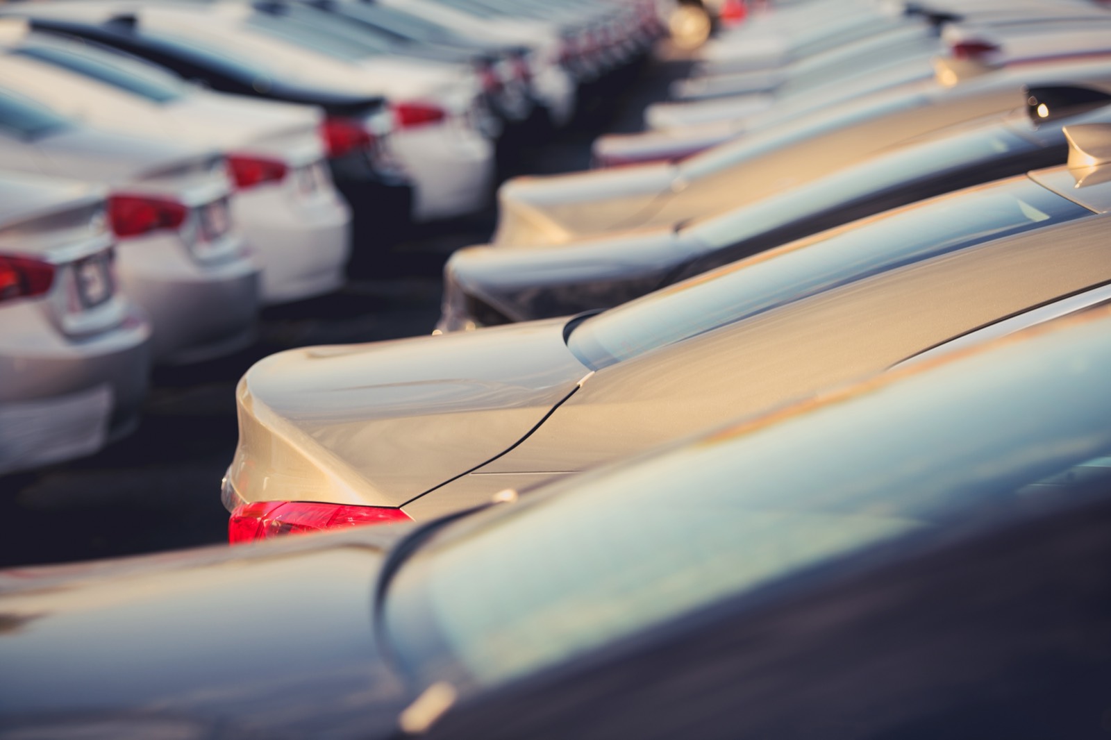 A corporate car park full of pool vehicles parked between bookings